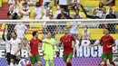 Penyerang Portugal, Diogo Jota berselebrasi usai mencetak gol ke gawang Jerman pada pertandingan grup F Euro 2020  di Allianz Arena, Munich, Sabtu (19/6/2021). Jerman menang telak atas Portugal dengan skor 4-2. (Philipp Guelland/Pool via AP)