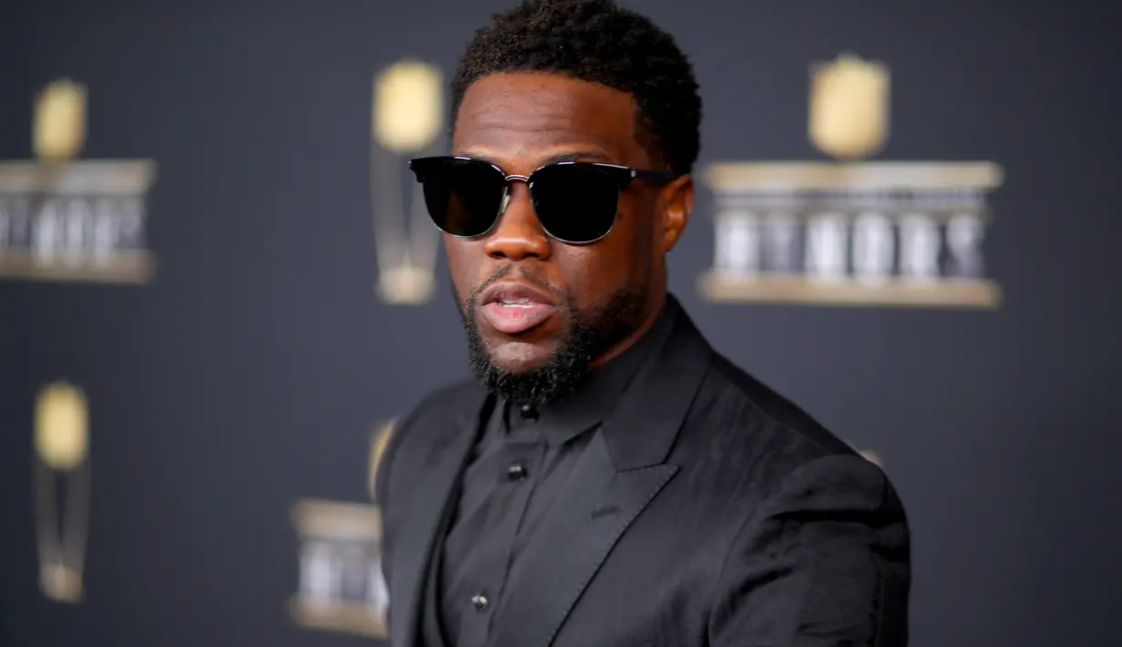 Kevin Hart pernah diancam karena ia dituduh berselingkuh saat istrinya, Eniko Parrish tengah hamil. Pengancam tersebut diam-diam mengambil video evin dengan Montia Sabbag. (CHRISTOPHER POLK / GETTY IMAGES NORTH AMERICA / AFP)