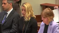 Ekspresi Amber Heard ketika pengadilan menyatakan ia mencemarkan nama baik Johnny Depp. Para juri meyakini Amber Heard memiliki niat yang buruk. Dok: YouTube
