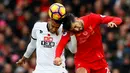 Pemain Liverpool, Emre Can (kanan), berduel dengan pemain Watford, Etienne Capoue, di Stadion Anfield pada laga lanjutan Premier League 2016-2017, Minggu (6/11/2016). (Action Images via Reuters/Jason Cairnduff)