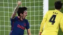 Bek Atletico Madrid, Stefan Savic, merayakan gol yang dicetak ke gawang Villareal pada laga Liga Spanyol di Stadion Ceramica, Minggu (28/2/2021). Atletico Madrid menang dengan skor 2-0. (AP/Jose Breton)