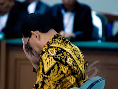 Terdakwa mantan Wakil Kepala Korlantas Mabes Polri, Brigjen (Pol) Didik Purnomo menjalani sidang pembacaan vonis di Pengadilan Tipikor, Jakarta, Rabu (22/4/2015). Didik divonis lima tahun penjara terkait kasus simulator SIM. (Liputan6.com/Yoppy Renato)