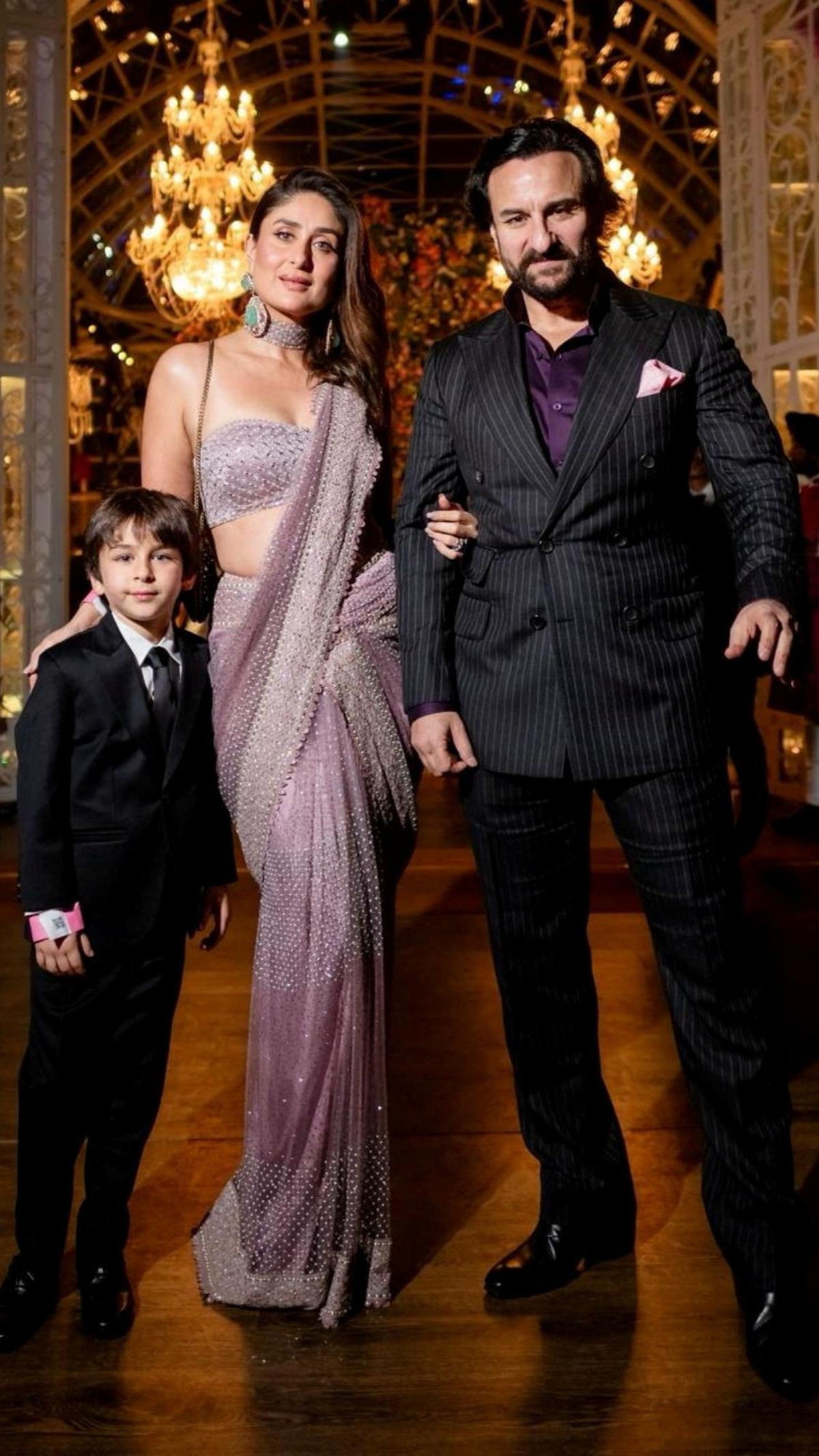 Aktor Saif Ali Khan dan Kareena Kapoor Khan bersama putra mereka Taimur Ali Khan saat menghadiri perayaan pranikah Anant Ambani, putra Mukesh Ambani, Ketua Reliance Industries, dan Radhika Merchant, putri industrialis Viren Merchant di Jamnagar, Gujarat, 