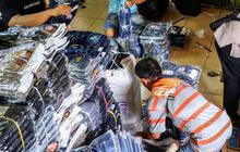 FOTO: Jelang Ramadan, Para Reseller Mulai Borong Baju Muslim di Pasar Grosir Jakarta