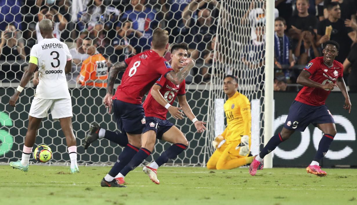Lille memcah kebuntuan pada menit ke-45. Xeka (tengah) berhasil merobek gawang Keylor Navas lewat tendangan keras dari luar kotak pinalti. Papan skor berubah menjadi 1-0 sekaligus menutup babak pertama dengan keunggulan Lille. (Foto: AP/Ariel Schalit)