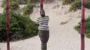 Pria yang bernama Hassan Hanafi ini ditangkap dan akan di eksekusi oleh regu tembak di Somalia, (11/4).Hassan Hanafi karena diduga terkait dalam pembunuhan sejumlah wartawan di Somalia. (REUTERS / Ismail Taxta)