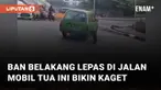 Sebuah mobil tua alami insiden tak terduga di jalan mengundang perhatian