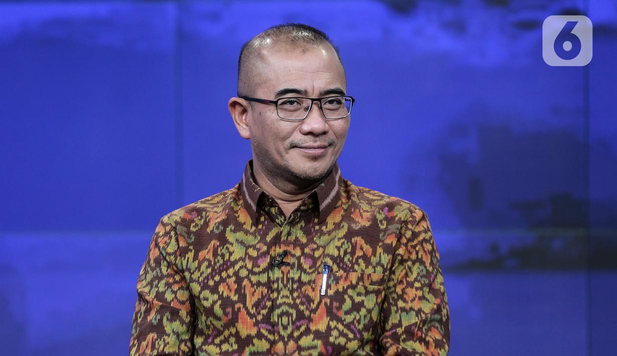 Ketua Komisi Pemilihan Umum (KPU) Hasyim Asy'ari saat acara penandatanganan MoU antara Emtek dengan KPU di SCTV Tower, Jakarta, Selasa (30/8/2022). Kerja sama KPU dengan Emtek ini terkait sosialisasi Pemilihan Umum yang akan diselenggarakan 2024 mendatang. (Liputan6.com/Johan Tallo)