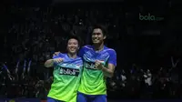 Tontowi Ahmad/Liliyana Natsir merayakan kemenangan atas pasangan Malaysia, Chan Peng Soon/Goh Liu Ying pada final Indonesia Open 2018 di Istora Senayan, Jakarta, (8/6/2018). Tontowi/Liliyana menang 21-17, 21-8. (Bola.com/Nick Hanoatubun)