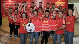 Tim sepak bola Indosat Ooredoo U-13 raih juara runner up di kompetisi Gothia Cup 2016 di Swedia, Jakarta, Selasa (2/8/2016). Tim zooredo U-13 Indonesia berhasil menyisihkan 1.659 tim dari 81 negara. (Liputan6.com/Yoppy Renato)