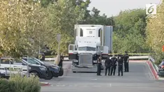 Sebuah truk kontainer berisi imigran ilegal terparkir di Texas, berisi 38 orang imigran ilegal terjebak di dalam kontainer.