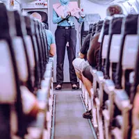 Ilustrasi pramugari. (dok. unsplash/ismail mohamed - SoviLe)