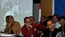 Ketua KPK bersama jajaran pimpinan melihat dokumentasi kerja KPK selama 2014 saat menggelar konferensi pers di Gedung KPK, Jakarta, Senin (29/12/2014). (Liputan6.com/Miftahul Hayat)  