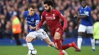 Aksi Mohamed Salah di laga antara Liveroool dan Everton. (AFP/Oli Scarff)