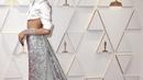 Zendaya berpose untuk fotografer setibanya pada perhelatan Academy Awards ke-94 atau disebut juga Piala Oscar 2022di Dolby Theatre di Los Angeles Minggu (27/3/2022). Zendaya tampil memukai mengenakan kemeja crop satin sutra dan rok metalik bling-bling. (Photo by Jordan Strauss/Invision/AP)