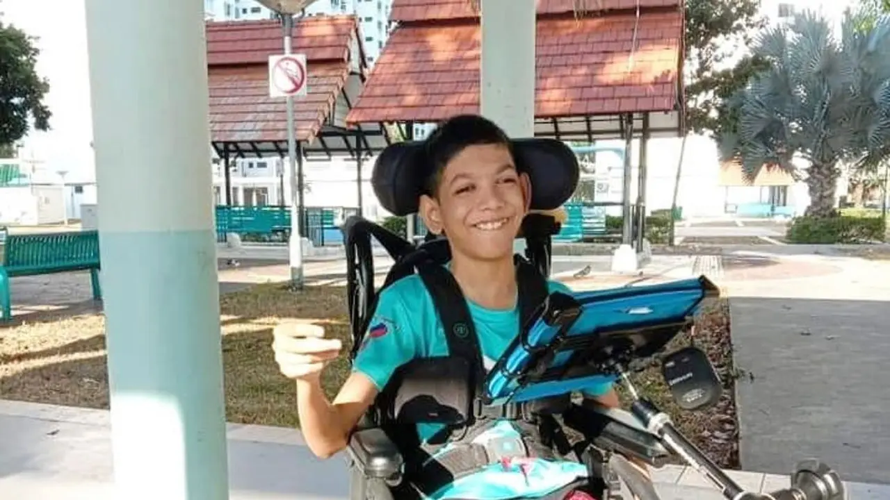 Penyandang disabilitas cerebral palsy Mohd Sayfullah.