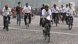 Peserta mengikuti kegiatan Sepeda Nusantara 2018 yang diselenggarakan Polri di kawasan Monas, Jakarta, Kamis (9/8). Kegiatan itu dihelat dalam rangka menyambut Asian Games 2018 dengan menggelorakan semangat berolahraga. (Liputan6.com/Immanuel Antonius)