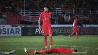 Ekspresi dua pemain Borneo FC, Matheus Pato (atas) dan Agung Prasetyo usai gagal menjebol gawang Arema FC. (Bola.com/Ikhwan Yanuar)