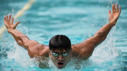 Pada Olimpiade 2016 Rio de Janeiro, perenang Indonesia, Glenn Victor, akan turun pada nomor 100 meter gaya kupu-kupu. (Bola.com/Vitalis Yogi Trisna)