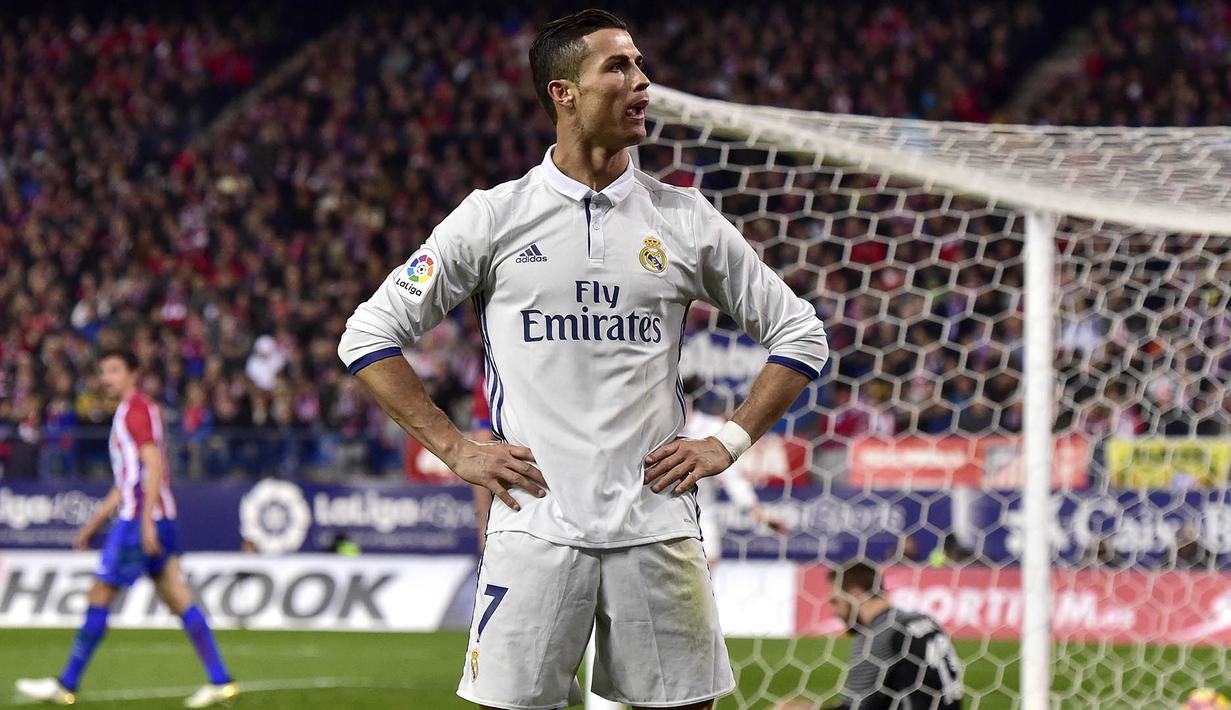 3. Cristiano Ronaldo (Real Madrid) - 42 gol dalam 44 laga. (AFP/Gerard Julien)