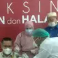 Wali Kota Kendari mengikuti Vaksinasi Covid-19.(Liputan6.com/Ahmad Akbar Fua)