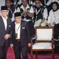 Calon Presiden dan Calon Wakil Presiden nomor urut 1, Anies Baswedan dan Muhaimin Iskandar dalam acara debat debat pilpres di Kantor KPU RI, Menteng, Jakarta, Selasa (12/12/2023) malam (Liputan6.com/Faizal Fanani)
&nbsp;