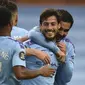 Gelandang Manchester City, David Silva (dua dari kanan, merayakan gol bersama rekan-rekannya pada laga kontra Newcastle United di Stadion Etihad, Kamis (9/7/2020) dini hari WIB. (Oli Scarff/AFP)