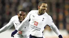 Tottenham Hotspur's Aaron Lennon celebrates his goal with Wilson Palacios during their Premier League match at KC Stadium in Hull, on February 23, 2009. AFP PHOTO/IAN KINGTON