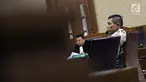 Pimpinan Tjokro Group, Kurniawan Eddy Tjokro saat menjalani sidang perdana kasus dugaan suap kepada Direktur PT Krakatau Steel, Wisnu Kuncoro di Pengadilan Tipikor, Jakarta, Rabu (12/6/2019). Sidang beragendakan mendengar pembacaan dakwaan dari JPU KPK. (Liputan6.com/Helmi Fithriansyah)