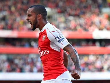Ekspresi Theo Walcott setelah mencetak gol pertama Arsenal ke gawang Stoke City dalam lanjutan Liga Premier Inggris di Stadion Emirates, London. Sabtu (12/9/2015). (Reuters/Dylan Martinez)