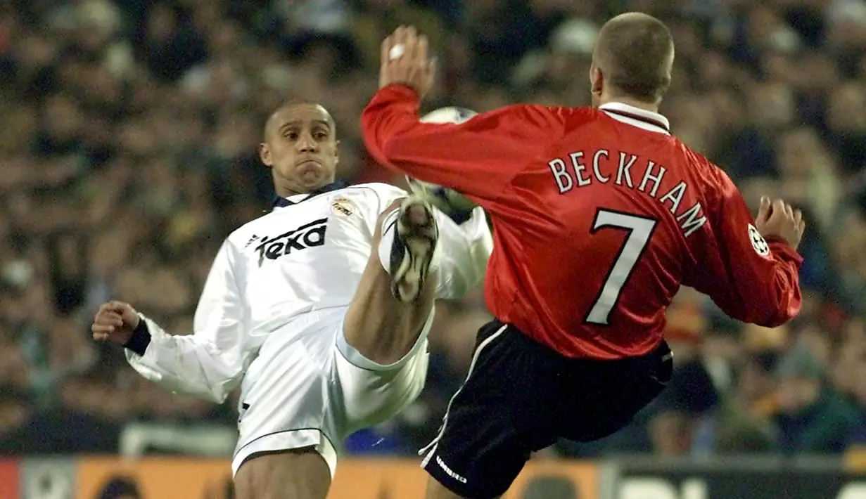 Roberto Carlos. Bek asal Brasil ini didatangkan Real Madrid dari Inter Milan pada awal musim 1996/1997. Selama total 11 musim hingga 2006/2007 telah bermain sebanyak 527 penampilan dengan mencetak 69 gol.(AFP/Christophe Simon)