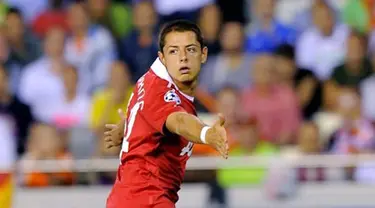 Kegembiraan Javier "Chicharito" Hernandez seusai mencetak gol tunggal kemenangan Manchester United atas Valencia pada laga Liga Champions, 29 September 2010. AFP PHOTO/JOSE JORDAN 