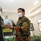 Kepala Perpusnas Muhammad Syarif Bando dan Bupati Magetan Suprawoto saat meresmikan Graha Pusat Literasi Kabupaten Magetan di Plaosan, Magetan, Jatim, Jumat (17/12/2021). (Liputan6.com/ Istimewa)