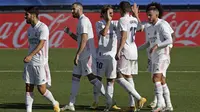 Real Madrid berpesta gol saat menjamu Huesca pada laga lanjutan Liga Spanyol di Estadio Alfredo Di Stefano. Karim Benzema yang tampil agresif mencetak dua gol dan membawa Real Madrid menang 4-1 atas Huesca. (AP Photo/Manu Fernandez)