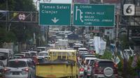Suasana arus lalu lintas Jalan Raya Puncak, Bogor, Jawa Barat, Kamis (29/12/2022). Rencana arus lalu  lintas di Kawasan Puncak akan ditutup total dari 31 Desember 2022 pukul 18.00 WIB sampai 1 Januari 2023  pukul 06.00 WIB. (merdeka.com/Imam Buhori)