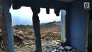 Kondisi rumah yang terkena proyek pembangunan Bendungan Ciawi di Desa Gadog, Bogor, Jawa Barat, Kamis (22/08/2019). Pembebasan lahan proyek pembangunan Bendungan Ciawi sudah lebih dari 90 persen. (Merdeka.com/Arie Basuki)