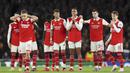 Pemain Arsenal tertunduk lesu setelah kalah adu penalti dari Sporting CP pada leg kedua babak 16 besar Liga Europa di Stadion Emirates, Jumat (17/3/2023). Langkah The Gunners terhenti di babak 16 besar setelah takluk dari wakil Portugal, Sporting CP. (AP Photo/Ian Walton)