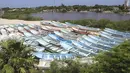 Setelah menyebabkan kerusakan di Jamaika pada hari Rabu, Badai Beryl bergerak cepat menuju Semenanjung Yucatan, Meksiko, tempat liburan populer di pantai timur Meksiko.  (AP Photo/Martin Zetina)