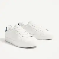 Basic White Sneakers. (Image: zara.com)