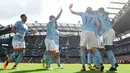 Pemain Manchester City merayakan gol kedua mereka saat melawan Liverpool dalam pertadingan Liga Inggris di Stadion Etihad, Manchester (9/9). Pada pertandingan tersebut Manchester City menang 5-0 atas Liverpool. (AFP Photo/Paul Ellis)