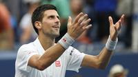 Ekspresi petenis Serbia, Novak Djokovic, seusai mengalahkan Gael  Monfils di semifinal AS Terbuka 2016, Sabtu (10/9/2016) pagi WIB. (EPA/Justin Lane)