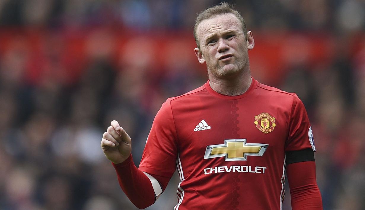 Nama Wayne Rooney di Manchester United memang tak perlu diragukan lagi kontribusinya. Ia telah menyabet trofi bergengsi seperti Liga Inggris dan Liga Champion bersama Setan Merah. Namun Rooney hanya menjadi peringkat lima besar pada ajang Ballon d'Or tahun 2011. (Foto: AFP/Oli Scarff)