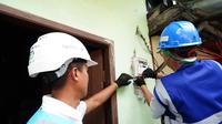 Program penggantian menjadi Smart Meter AMI di lingkungan kerja PLN Unit Induk Distribusi Jakarta Raya pada tahun 2023 dimulai hari ini di kawasan Teguk Gong, Jakarta Utara, yang merupakan pelanggan PLN UP3 Bandengan. Dok PLN