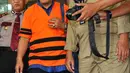 Ilham Arief Sirajuddin berjalan usai menjalani pemeriksaan di gedung KPK, Jakarta, Selasa (28/7/2015). Ilham diduga tersangkut korupsi pelaksanaan kerja sama rehabilitasi dan transfer kelola air di PDAM Makassar 2006-2012. (Liputan6.com/Yoppy Renato)