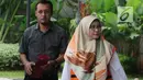 Hakim Pengadilan Negeri Tangerang Wahyu Widya Nurfitri dikawal petugas menuju gedung KPK untuk menjalani pemeriksaan, Jakarta, Selasa (24/4). (Merdeka.com/Dwi Narwoko)