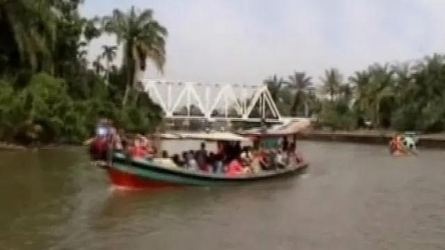 Sepekan pasca Lebaran kawasan wisata sungai Kualuh di Labuhanbatu, Sumatera Utara ramai dikunjungi warga.