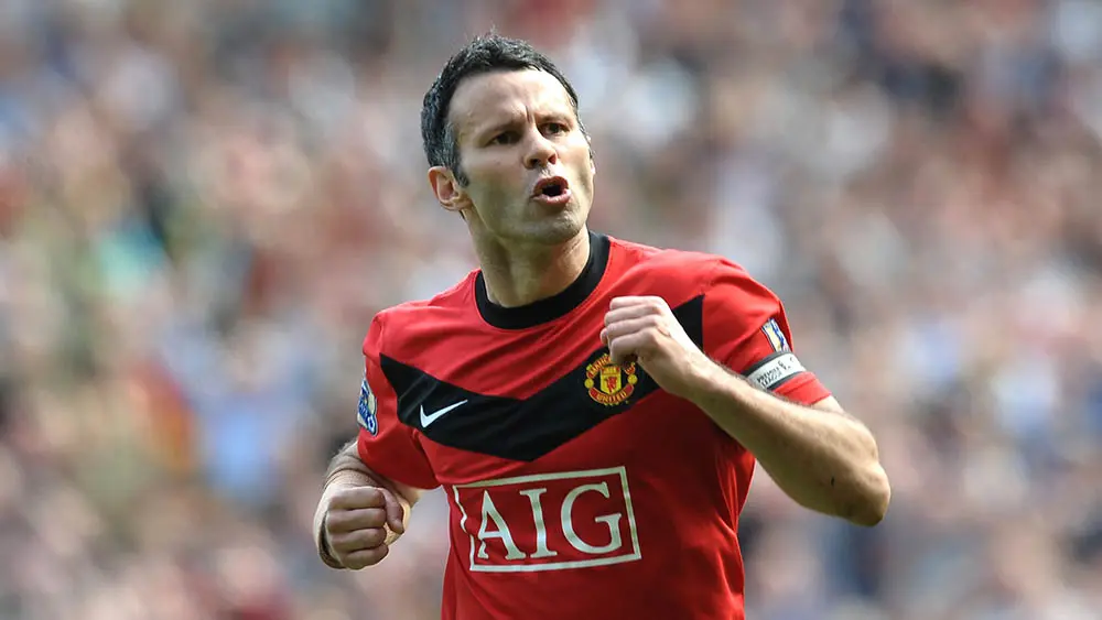 Ryan Giggs saat masih berkostum MU. (AFP/Paul Ellis)