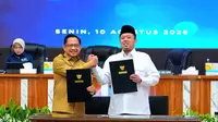 Mendagri Tito Karnavian dan Menteri ATR/BPN Nusron Wahid meneken Surat Edaran Bersama (SEB) tentang Mekanisme Penerimaan Setoran dan Penelitian Surat Setoran Pajak Daerah Bea Perolehan Hak atas Tanah dan Bangunan (BPHTB). (Kemendagri)