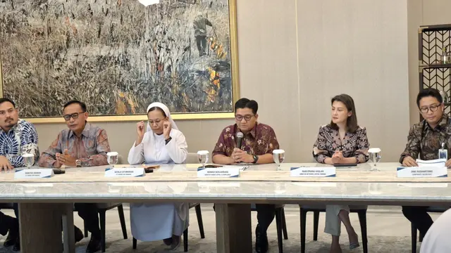 Direktur Human Capital and Compliance BNI, Munadi Herlambang dalam konferensi pers dana nasabah umat Gereja Aek Nabara di Grha BNI, Jakarta, Rabu (22/4/2026). (Liputan6.com/Arief)