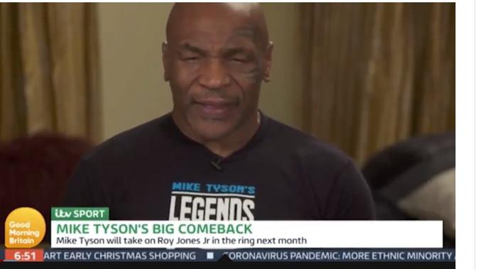 Mike Tyson tidak kuasa menahan kantuk saat tampil di siaran langsung apa kabar Britain (tangkapan layar)